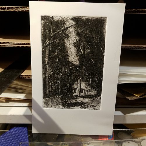 small print of a cabin in the woods, small cabin is overshadowed by large trees
