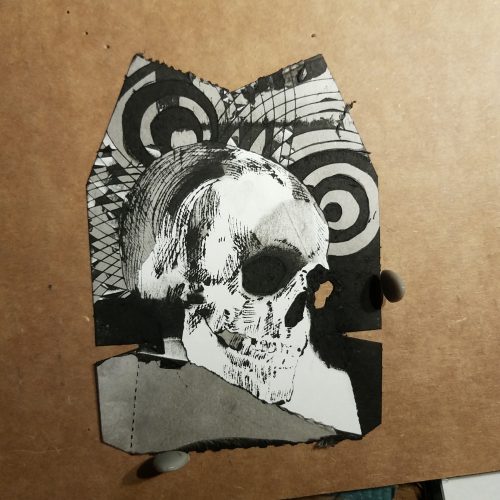 Skull etched into flatten hershey pie carton